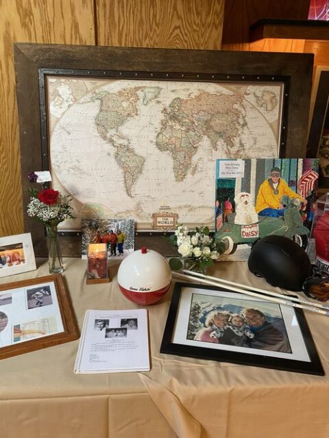Bobber urn surrounded by personal memerobilia