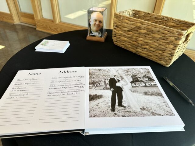 Custom photo register book produced by SendOff