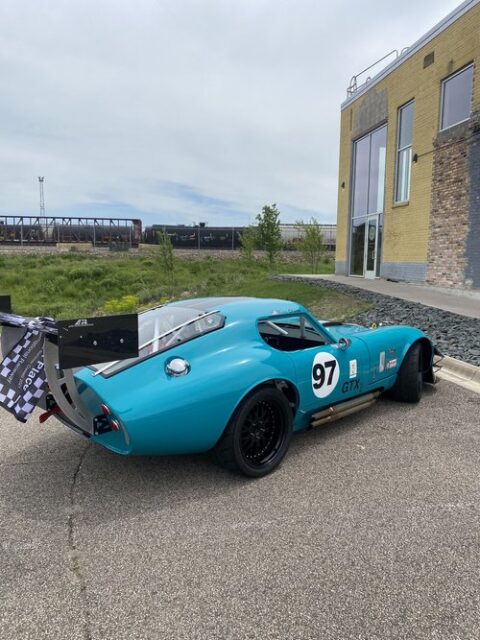 His racecar on display outside the venue